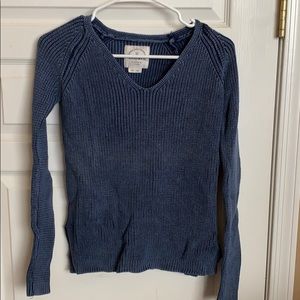 Washed out blue sweater